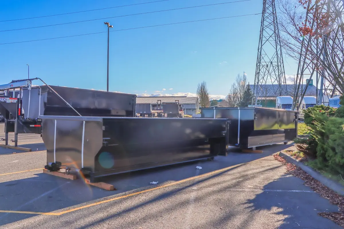 Roll-off dumpster ready for waste disposal at job site for 6 Yard Dumpster Rental in Bozeman